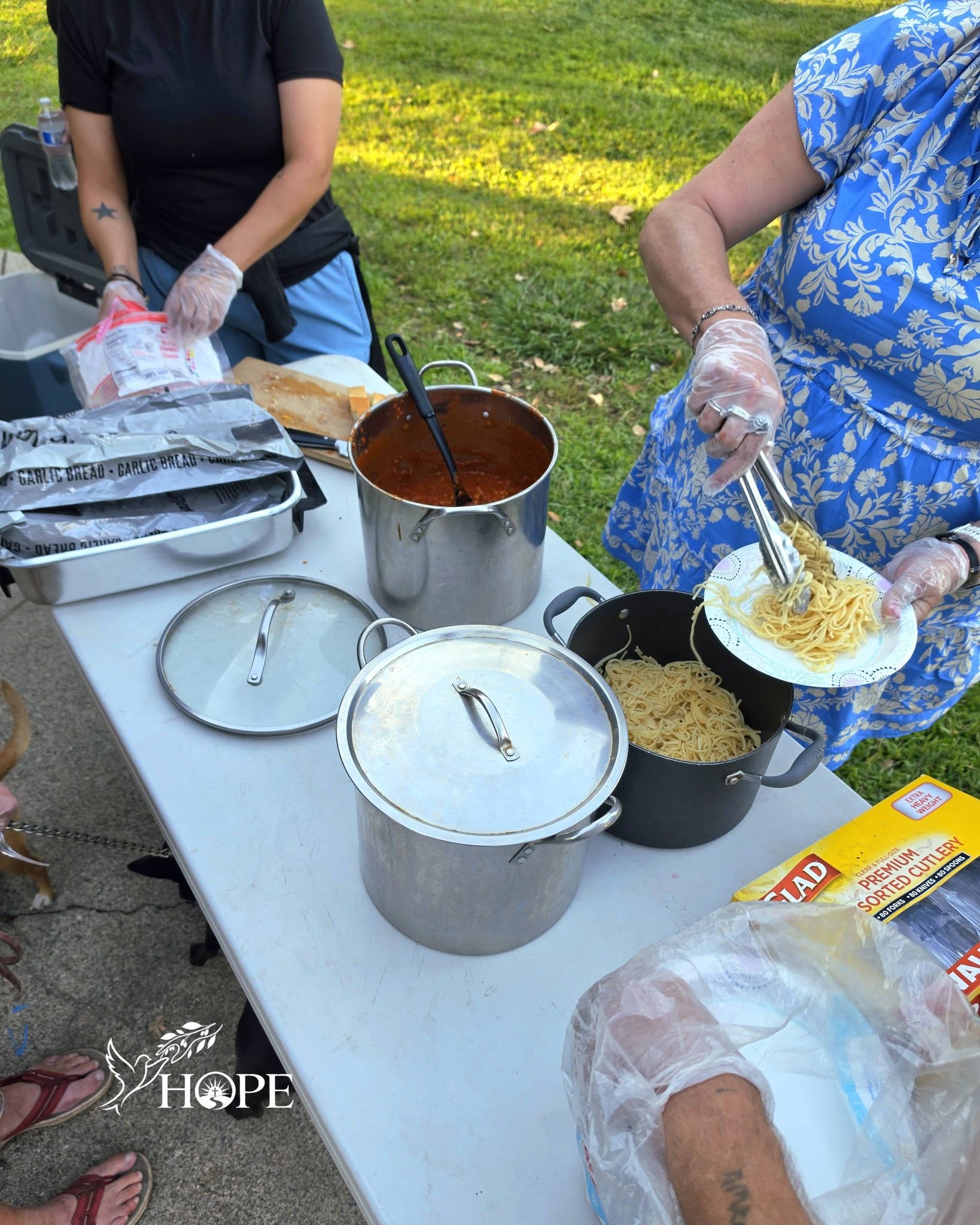 Hope Ministries volunteers serving a community meal